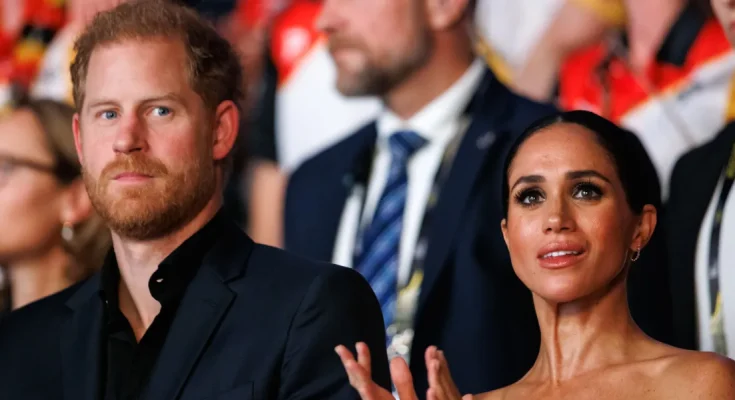 Meghan's Public Displays of Touch Toward Harry Reflect 'A Desire to Keep Him Close' — Insights from a Body Language Expert