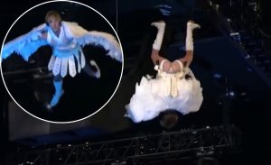Justin Bieber, dressed in an angel suit, found himself falling into the lap of none other than Eminem during a live performance. The amusing incident occurred at a high-energy event, where both superstars were sharing the stage for a special collaboration. Out of all the people, it had to be Eminem and Eminem be like I should make a diss track on you