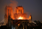 Hundreds evacuated after Paris' Eiffel Tower catches fire