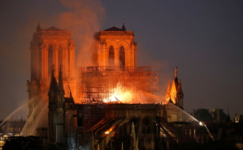 Hundreds evacuated after Paris' Eiffel Tower catches fire