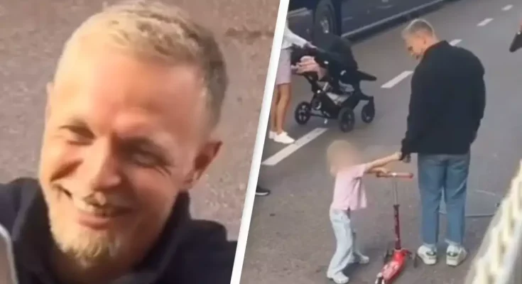 Heartwarming moment 3-year-old daughter of F1 Driver Kevin Magnussen forces dad to turn around and sign fan’s notebook