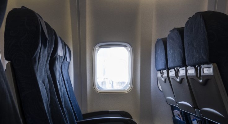 Woman who refused to swap seats with crying toddler sues airline and passenger who filmed her