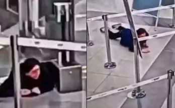 Shocking moment woman crawls under airport security barrier before sneaking onto plane unnoticed