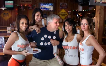 Restaurant chain known for uniformed waitresses is ‘going bankrupt’ Jessica Kwong Jessica Kwong Published February 21, 2025 4:52pm Updated February 21, 2025 4:52pm Comments AX769P Hooters girls with a male customer on his birthday Hooters is reportedly preparing to file for bankruptcy (Picture: Alamy Stock Photo) The American restaurant chain Hooters, famous for its waitresses wearing tight-fitting sporty uniforms, is reportedly heading toward bankruptcy. Hooters is preparing to file for bankruptcy to restructure its business likely in the next two months, sources told Bloomberg on Friday. The plans, underway with the law firm Ropes & Gray, are not definite. The casual dining chain has experienced a drop in customers and closed some locations in recent years. In 2021, Hooters sold roughly $300million in bonds backed with assets which included franchise fees. Hooters went ‘from humble beginnings to worldwide success’, according to the history page on its website. symbol 00:00 02:24 Read More J8J8CC Montreal, Canada - May 27, 2017: Hooters girls at the window of the restaurant on the trendy Crescent Street that opened in March of 2017. Hooters is a sports bar-style casual dining chain with waitresses who dress in a signature uniform (Picture: Alamy Stock Photo) The first Hooters opened in 1983 in Clearwater, Florida, when ‘six businessmen with no restaurant experience whatsoever got together to open a place they couldn’t get kicked out of’, states the site. ‘More than three decades later, the Hooters brand has grown into an international sensation, with more than 420 Hooters in 29 countries,’ it states. ‘How do you say Hooters in all those languages? Here’s a hint. It’s just Hooters.’ The chain’s restaurants serve sports bar-type fare, beer and are equipped with TV screens broadcasting popular games. OLYMPUS DIGITAL CAMERA Hooters Girls are the restaurant chain’s iconic waitresses (Picture: Shutterstock) Its waitresses, called Hooters Girls, wear short orange shorts and low-cut tank tops or T-shirts with the company’s name in orange and an owl’s eyes behind the two O’s in Hooters. The signature look has prompted the company to include a section in its frequently asked questions on whether the public can buy the Hooters Girl uniform. ‘The Hooters Girl is every bit as special and coveted to us as she is to you. As a result, the Hooters Girl uniform is only available to actively employed Hooters Girls. We are very protective of our girls and our brand,’ it reads. More Trending Elon Musk holds a chainsaw reading "Long live freedom, damn it" during the annual Conservative Political Action Conference (CPAC) at the Gaylord National Resort & Convention Center at National Harbor in Oxon Hill, Maryland, on February 20, 2025. (Photo by SAUL LOEB / AFP) (Photo by SAUL LOEB/AFP via Getty Images) Elon Musk wields a chainsaw and dances on stage in bizarre appearance US 22 hours ago By Sarah Hooper Donald Trump says Zelensky brings 'no cards' and isn't important in Russia peace talks Luigi Mangione wears bulletproof vest in first court appearance since arraignment Amazon delivery driver runs over woman and flees after getting out to look at her ‘We do, however, offer the classic Hooters Girl orange shorts. We also sell a ribbed tank top and the lycra tank top just like our girls wear. Name tags, pouches, and panty hose are not available to the public.’ Hooters restaurant logo in thailand The first Hooters opened in 1983 in Clearwater, Florida (Picture: Shutterstock) Hooters has been working on its debt issues with its attorneys and a boutique firm, Accordion Partners. Debtholders have also reportedly asked Houlihan Lokey Inc to advise. Its reported bankruptcy preparations come as numerous restaurant chains have closed more locations in the struggle to survive. Last week, the casual diner chain Denny’s confirmed it is closing 38 more locations on top of the 150 it had already announced would be axed. Retail stores in the US are also in trouble, and a research group predicts that 15,000 stores will close across the country this year – double the figure last year.