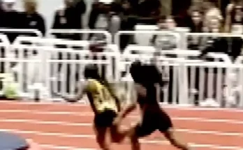 Runner who hit opponent over head with baton shares new footage of incident as she faces assault charge